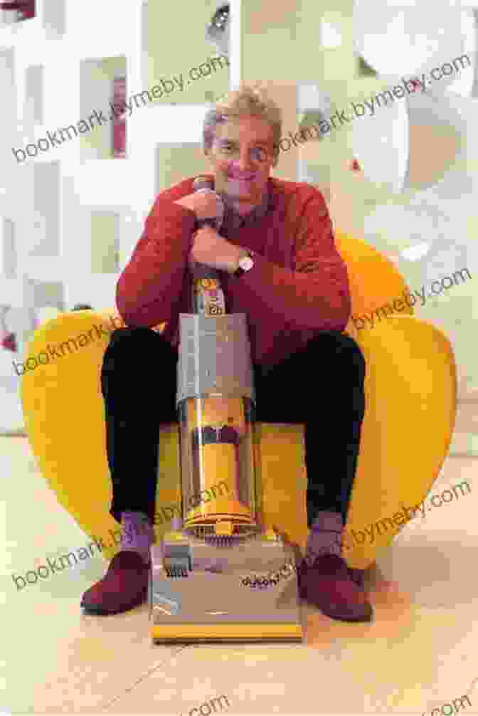 A Photograph Of James Dyson Standing Next To His First Commercially Successful Vacuum Cleaner, A Sleek And Modern Looking Appliance. Invention: A Life James Dyson