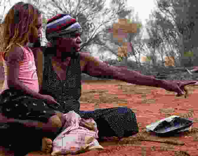 A Woman Interacting With A Group Of Aboriginal Elders In The Australian Outback Tracks: One Woman S Journey Across 1 700 Miles Of Australian Outback