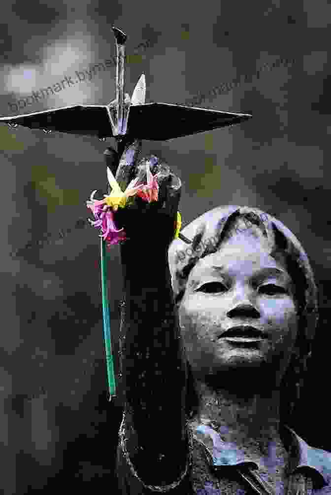 A Young Girl, Sadako Sasaki, Holding A Paper Crane With The Children's Peace Statue In The Background One Thousand Paper Cranes: The Story Of Sadako And The Children S Peace Statue