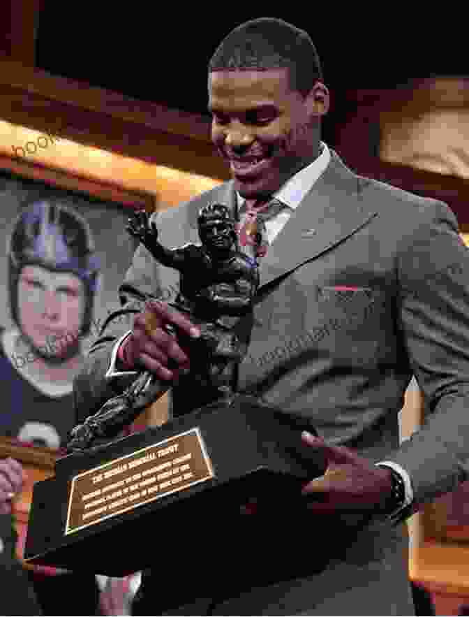 Cam Newton Holding The Heisman Trophy Cam Newton (Amazing Athletes) Jon M Fishman